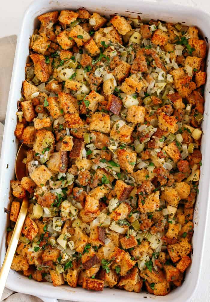 This Sausage, Apple and Herb Stuffing combines sourdough bread with a delicious mixture of sweet apples and savory sausage, onion, celery and fennel along with fresh herbs for the perfect Thanksgiving side dish your whole family will love!