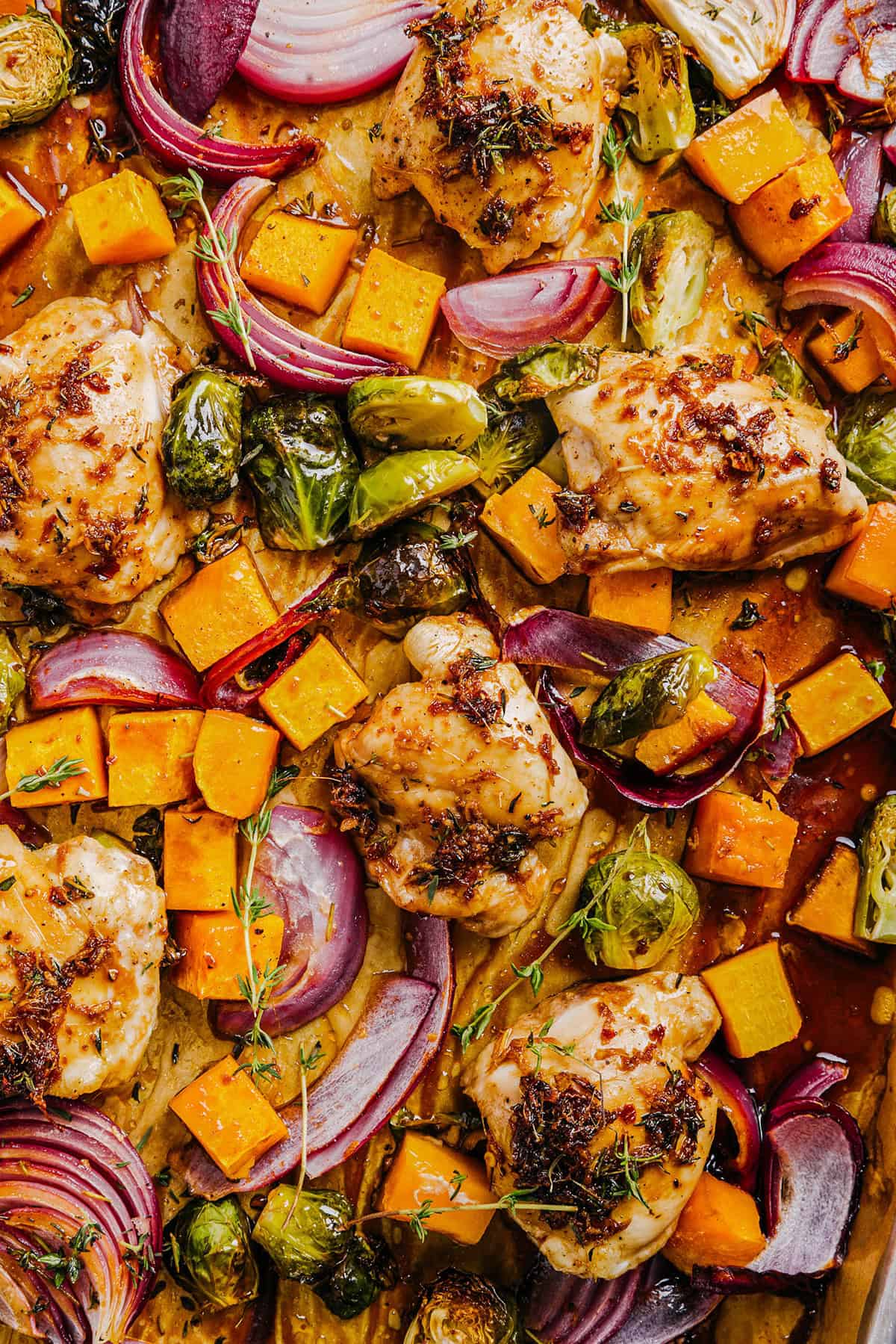 This Sheet Pan Maple Glazed Chicken with Vegetables is healthy, delicious and easily made all on one pan in under 30 minutes! The most flavorful weeknight dinner that is perfect for your fall meal prep!