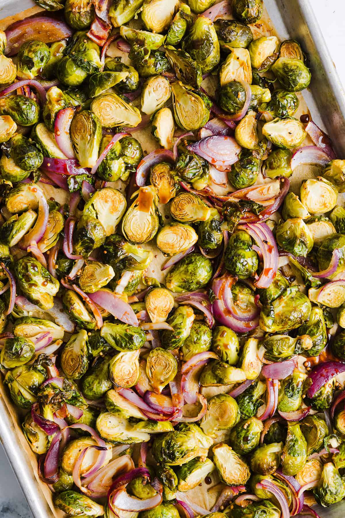 These Balsamic Roasted Brussels Sprouts make the perfect side dish that is so flavorful and easily made in under 30 minutes! The honey balsamic glaze is simply incredible!