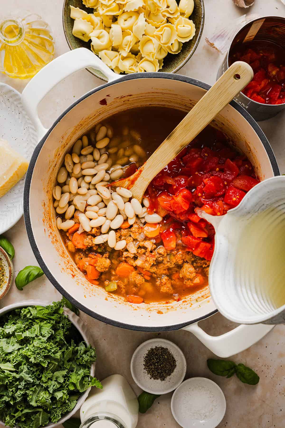 This Creamy Tortellini Soup is cozy, comforting and made with tender cheese tortellini, fresh veggies, herbs and a rich creamy broth. The perfect one pot meal that is both flavorful and satisfying!