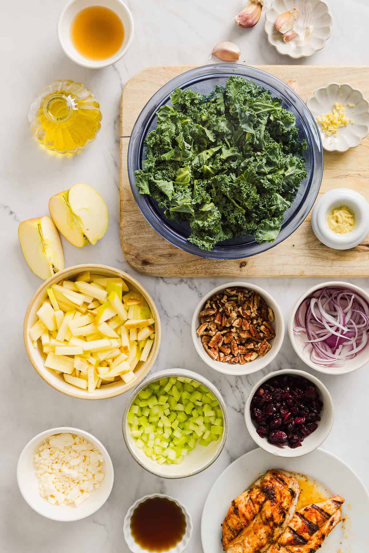 This fresh and flavorful Harvest Chopped Chicken Salad is made with leafy kale, tender juicy chicken, chopped apples and crunchy pecans all tossed with a maple dijon dressing! This salad is hearty enough for dinner and light enough for lunch!