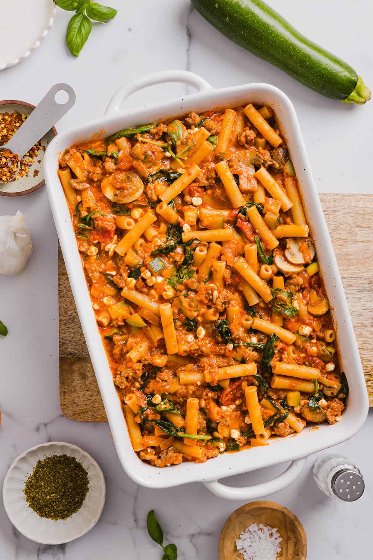 Comforting and delicious Healthy Baked Ziti packed with veggies, flavorful turkey sausage and makes the perfect weeknight meal the whole family will love!  Leftovers guaranteed!