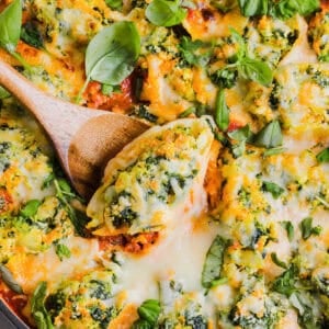 These cozy Veggie and Cheese Stuffed Shells are a family favorite that are loaded with vegetables, easy to freeze and make the perfect weeknight meal! The ultimate comfort food with a healthy twist!